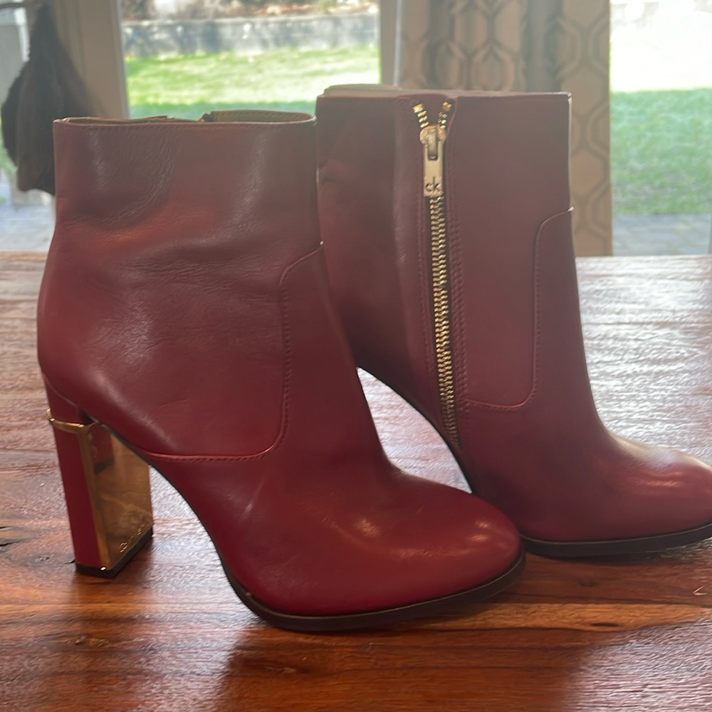 Calvin Klein red/gold booties.  Never worn.